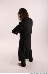 Man Adult Average White Daily activities Standing poses Coat